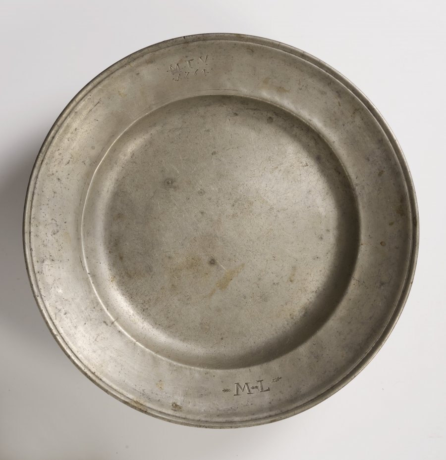 A GROUP OF FOUR PEWTER PLATES