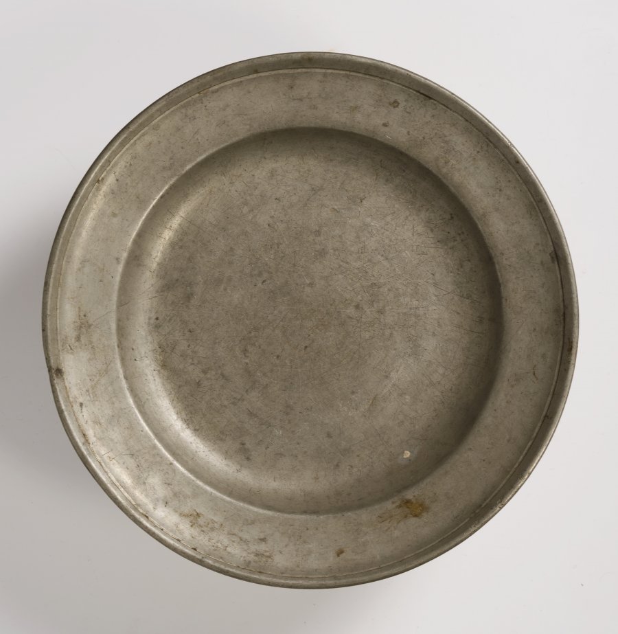 A GROUP OF FOUR PEWTER PLATES