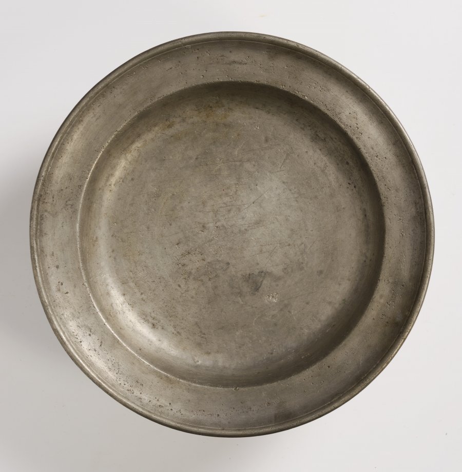 A GROUP OF FOUR PEWTER PLATES