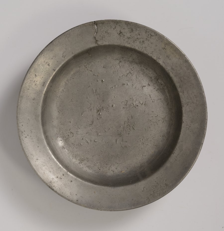 A GROUP OF FOUR PEWTER PLATES