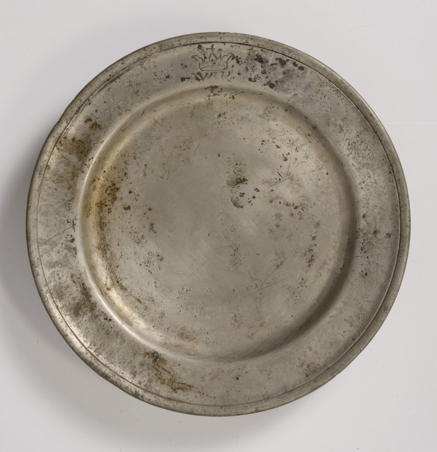 A GROUP OF FOUR PEWTER PLATES