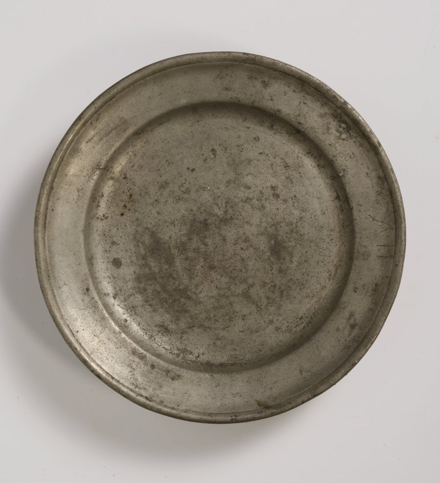 A GROUP OF FOUR PEWTER PLATES