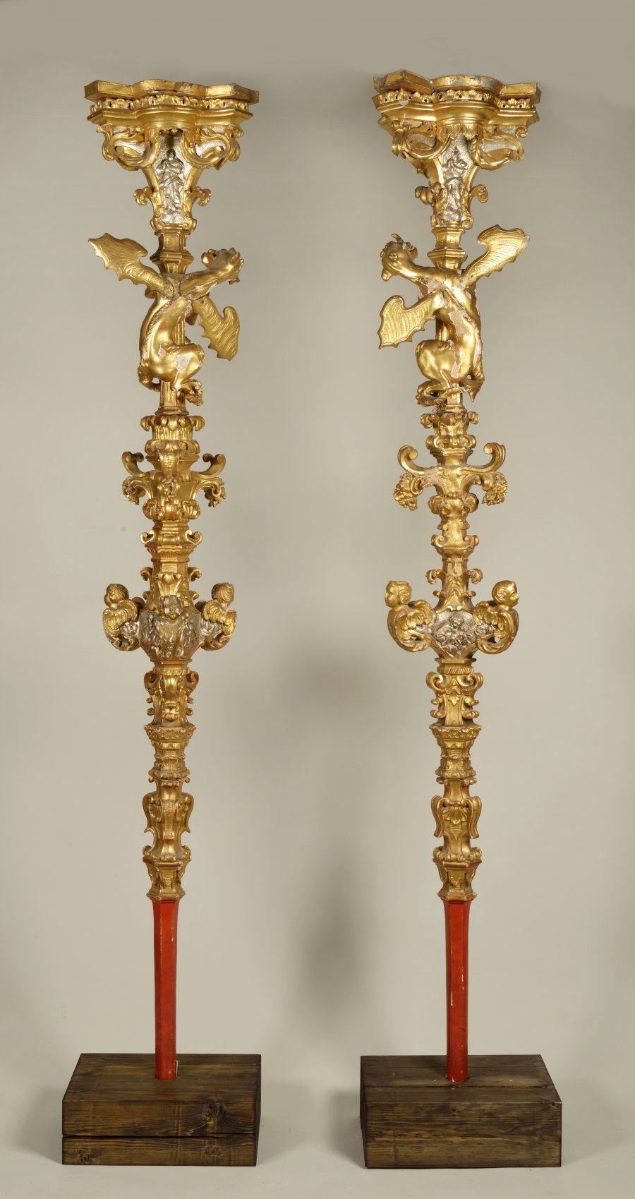 A PAIR OF PROCESSIONAL CANDLE HOLDERS