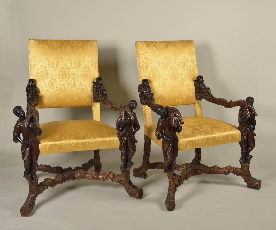 A PAIR OF ARMCHAIRS IN THE STYLE OF CELEBRATED VENETIAN CARVER ANDREA BRUSTOLON