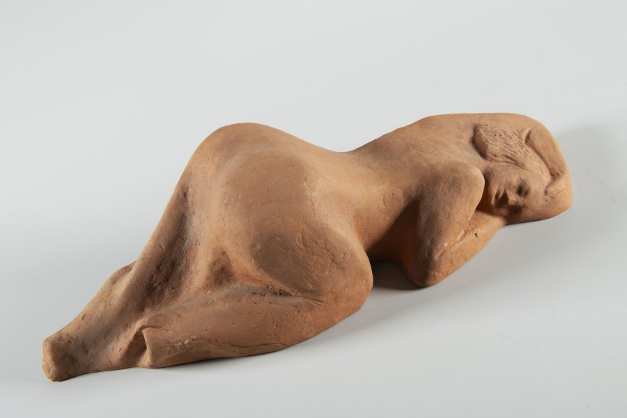 RECUMBENT WOMAN