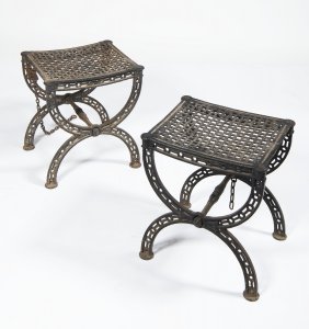 TWO CAST IRON STOOLS