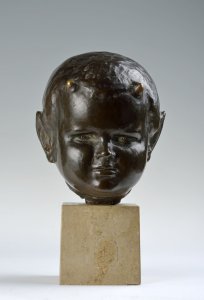 A BRONZE HEAD OF A YOUNG FAUN