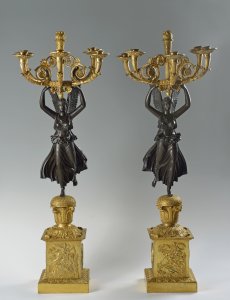 A PAIR OF EMPIRE CANDLEHOLDERS