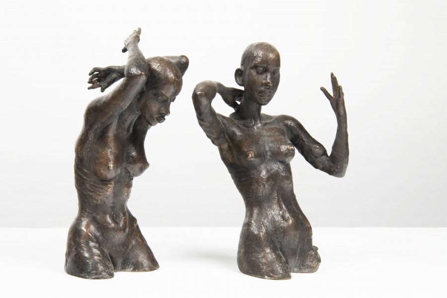 TWO HALF-FIGURES