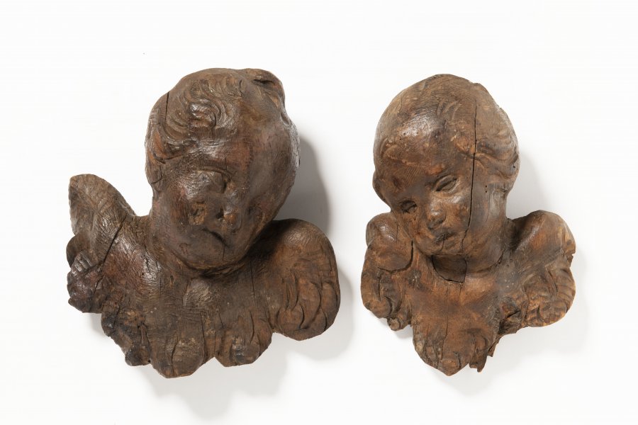 TWO PUTTI'S HEADS