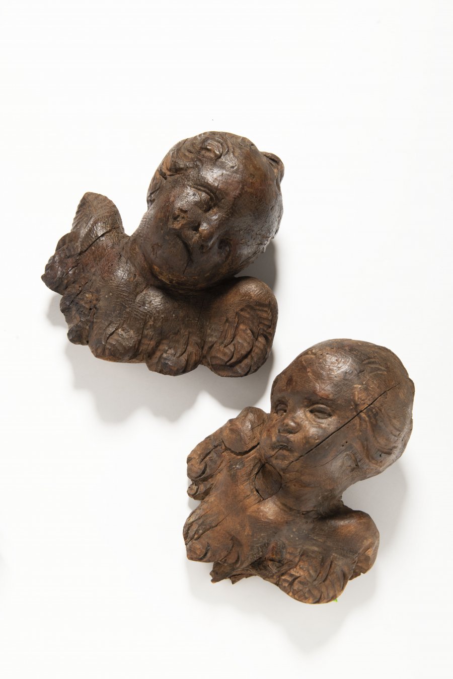 TWO PUTTI'S HEADS