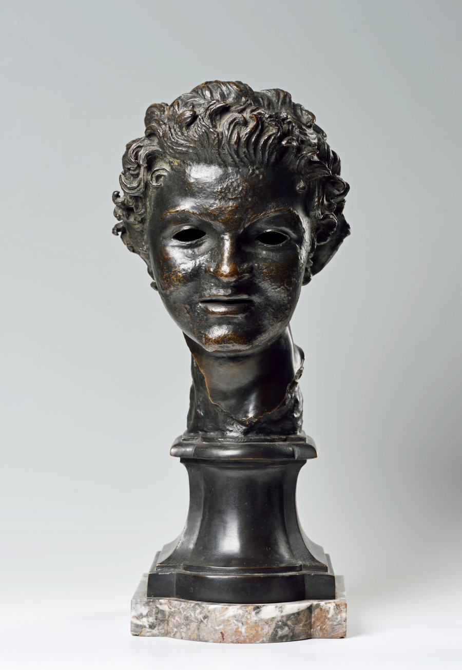 A BUST OF A YOUNG MAN