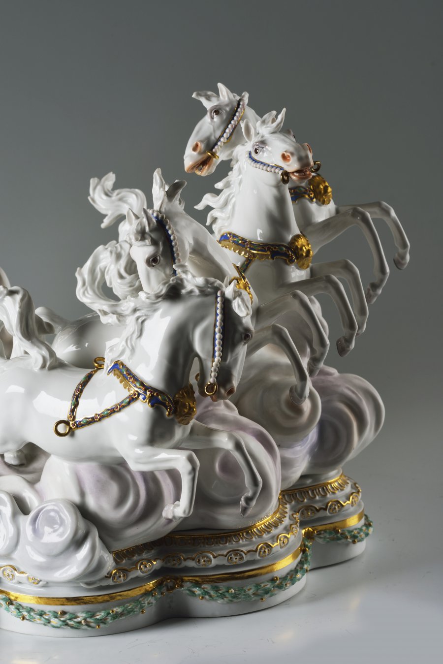 A PORCELAIN STATUE OF APOLLO