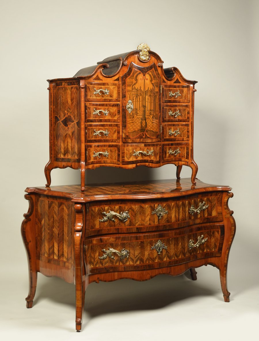 A BAROQUE COMMODE WITH TOP PIECE